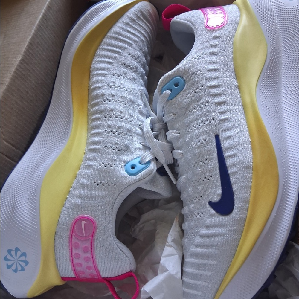 Nike Light Gray Sneakers with Blue and Yellow Highlights